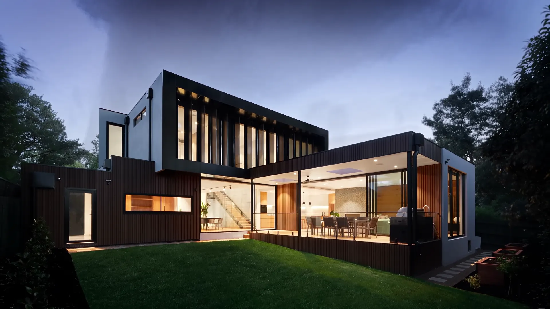 Finished modern home glowing at dusk